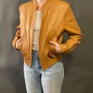 Tan Leather Jacket with Stand-Up Collar and Fitted Silhouette